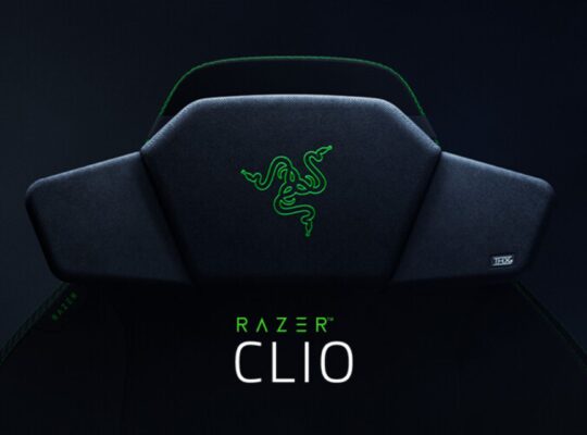 a black and green seat with a logo on it